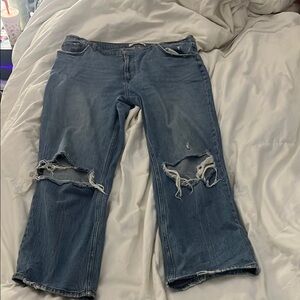 Blue Boyfriend Jeans with Distressed Knees and Cropped Hem